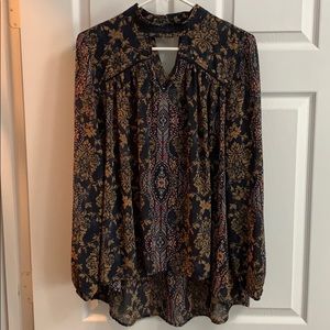 Boho blouse with keyhole neck and lace detail